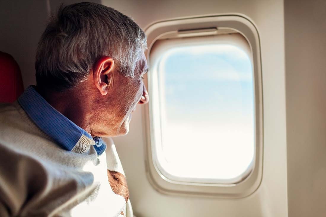 Voli lunghi con il Parkinson: come prevenire la rigidità e il freezing